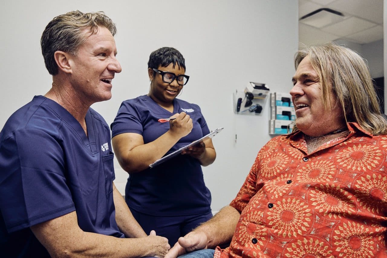 couple cooking and smiling together